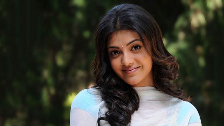 Kajal Aggarwal Smiling Cute Eyes Looking Front